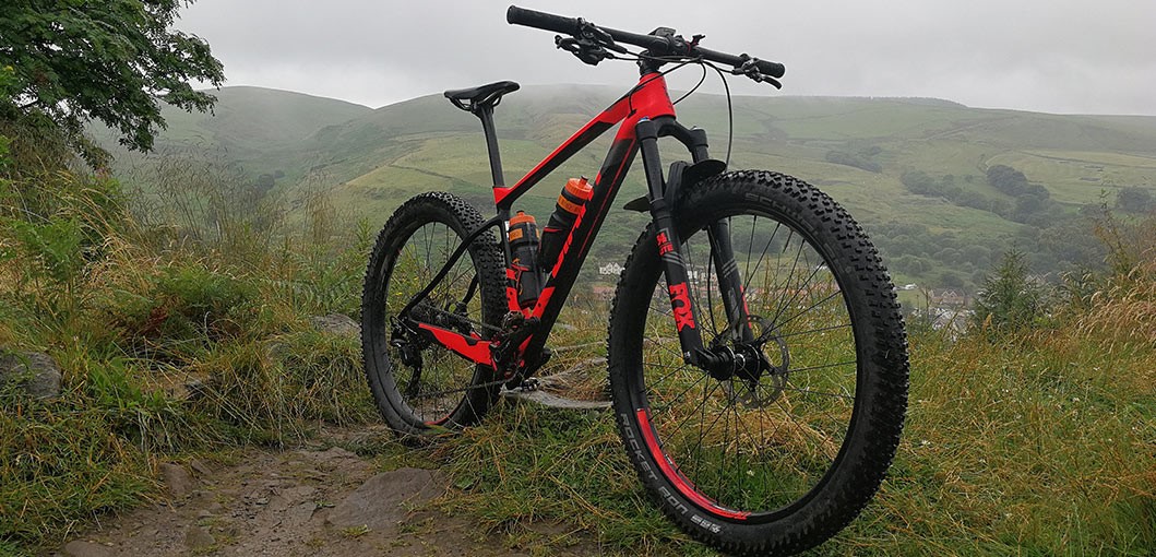 Angled shot of the bike with hills & mountains in the background